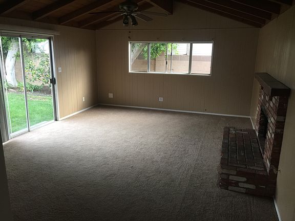 back bonus room with fireplace