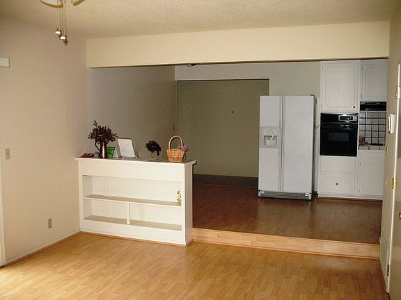 Dining Area From Family Room with Built In Bookshelves