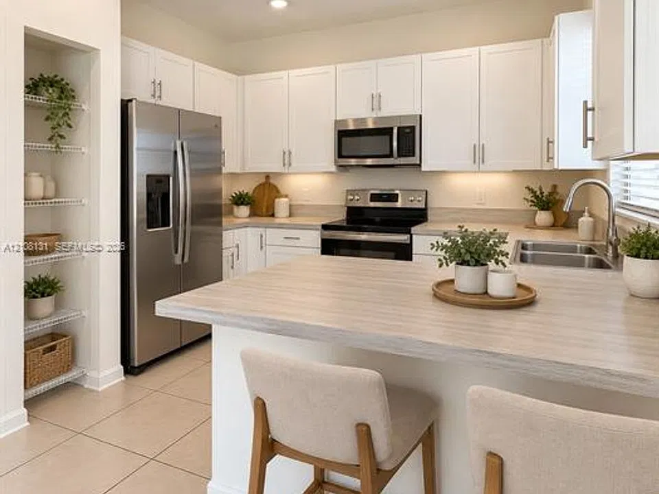10962 W 33rd Ct #Townhouse 10962