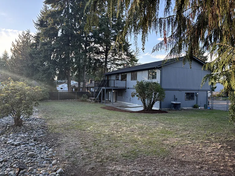 Another view of the spacious back yard with plenty of space for kids (or maybe pets) to play!