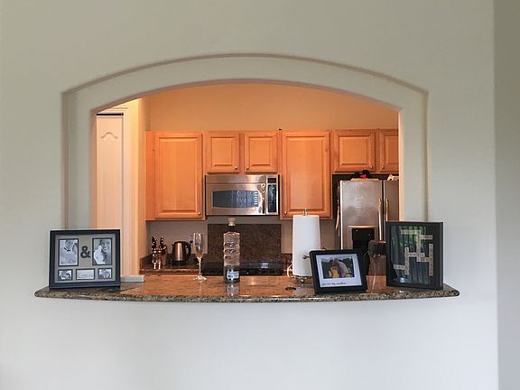 Passthrough window from living room to kitchen.