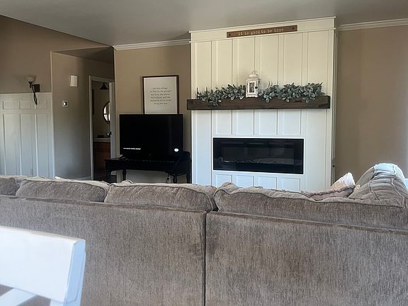 Updated living room, electric fireplace, lvp flooring.