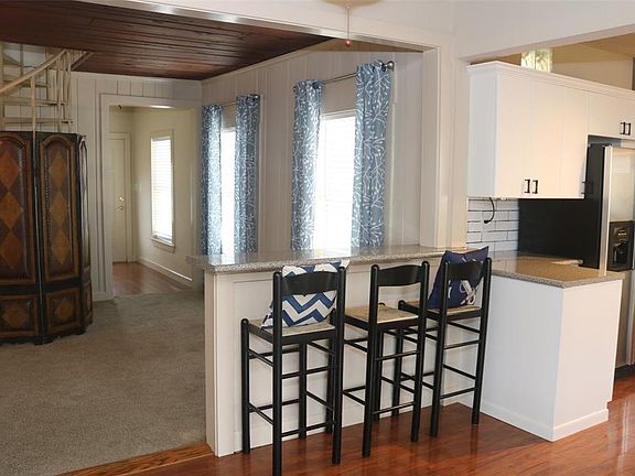 Breakfast bar open to living room