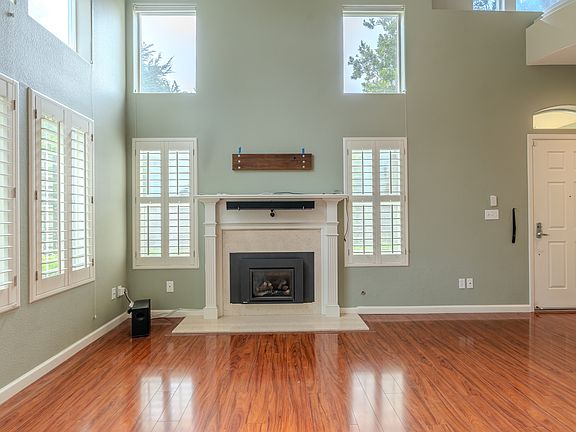 Living room showing front door on the right.