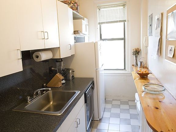 Bright Windowed Kitchen with a D/W and Plenty of Counter Space