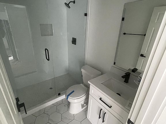 Completely renovated bathrooms with updated fixtures.