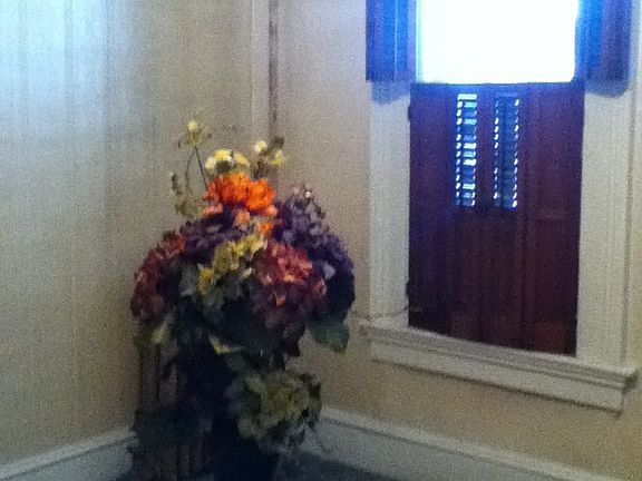 sitting room with shutters
