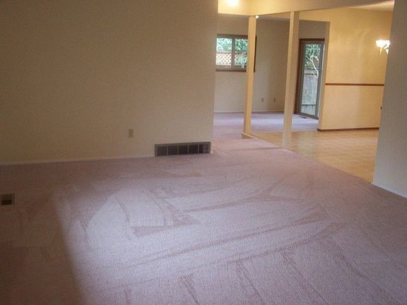 Looking from the living room towards the dining room and the family room.