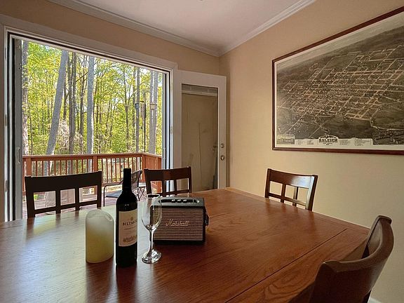 The dining room has double doors which open to the deck, with a retractable screen.