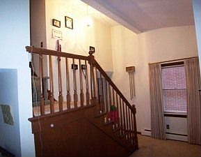 Staircase to upper level bedrooms!