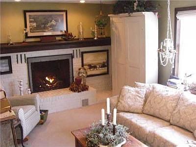 cozy family room or den .. would make a great office! gas fireplace