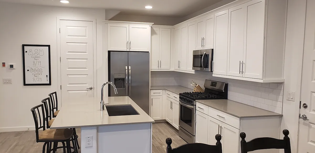 Kitchen with Pantry and Gas Stove - 9924 E Tahoe Ave