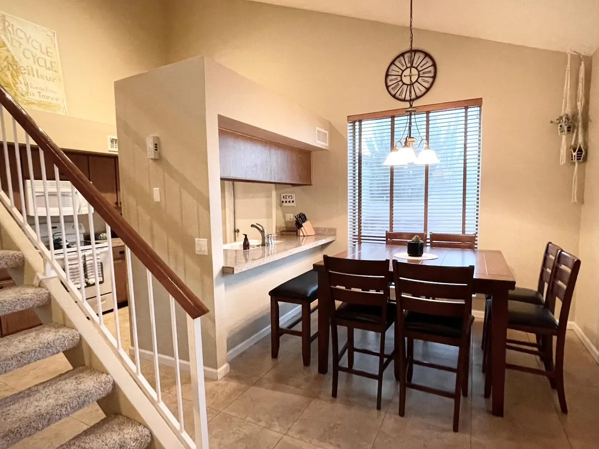 Dining room located next to the kitchen, just off the living room - 8821 W Saint John Rd