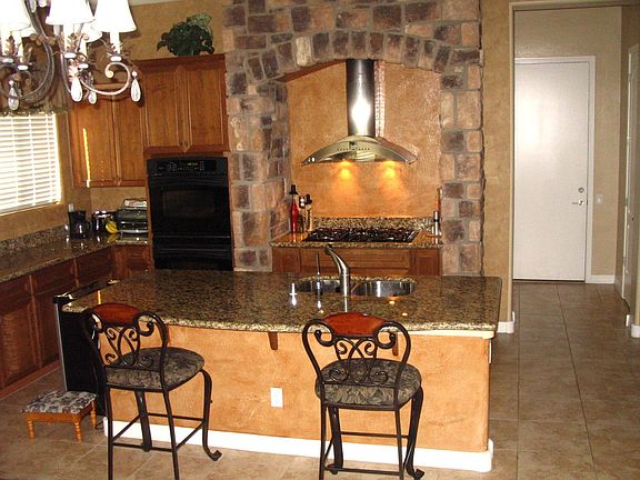 granite countertops, double ovens, gas range, pecan cabinetry, r.o.