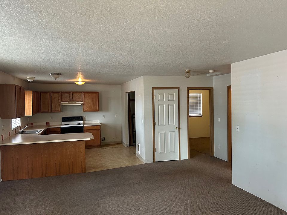 Open floor plan_floors to be replaced with luxury vinyl plank.