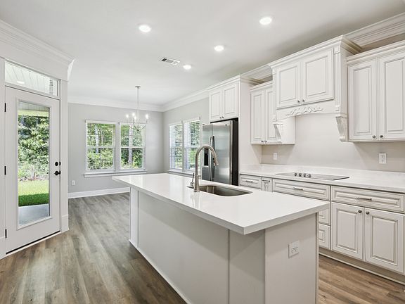 Kitchen in the Jules floorplan at a Meritage Homes community in Gulfport, MS.