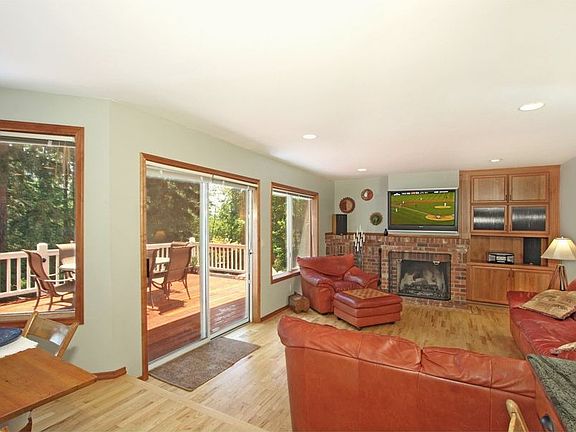 The inviting family room looks out to the deck.