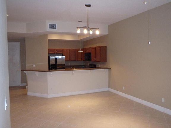 Living room with fresh new paint including baseboards.