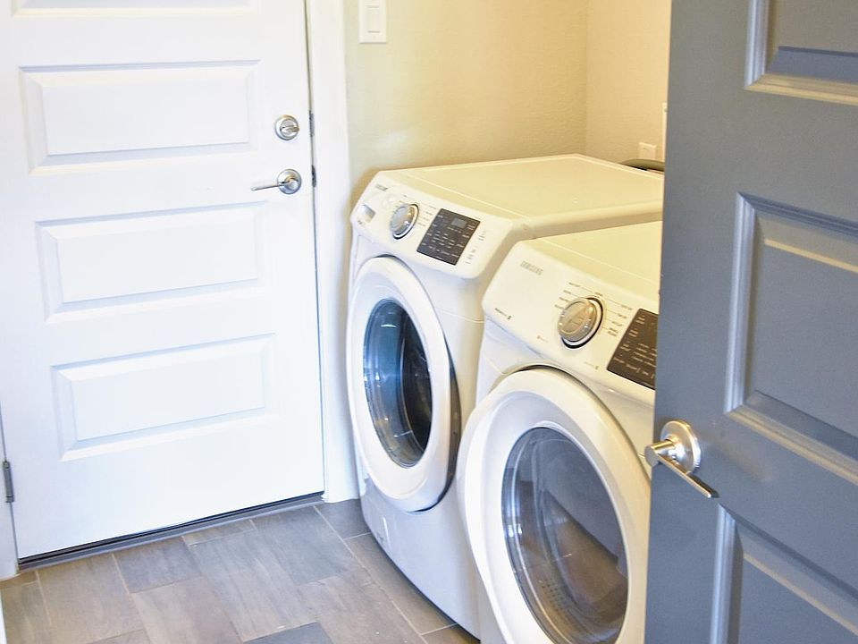 Front loading washer and dryer included with this rental!