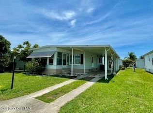 911 Oriole Cir, Barefoot Bay, FL 32976