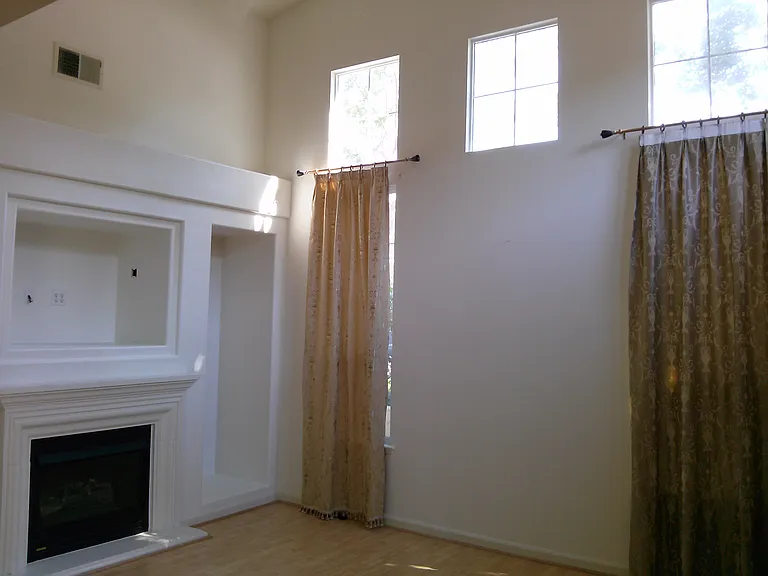 Living/family room with high vaulted ceiling