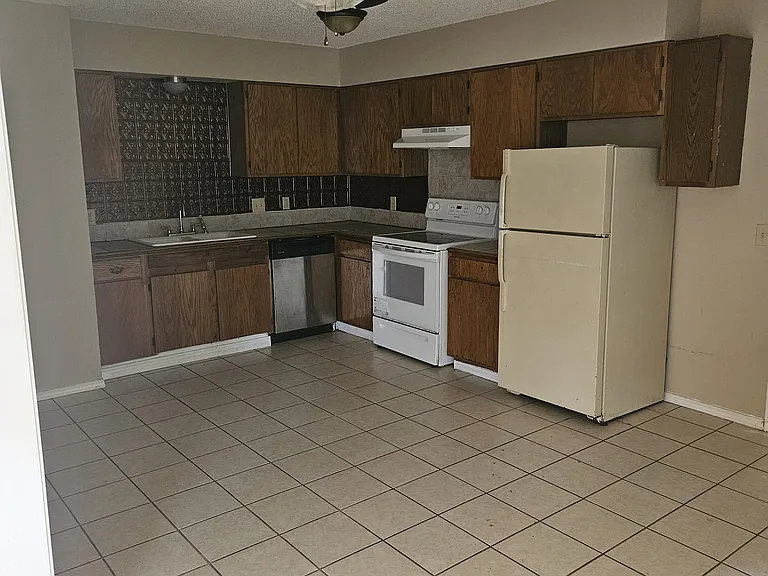 Refridgerator NOT included with house.