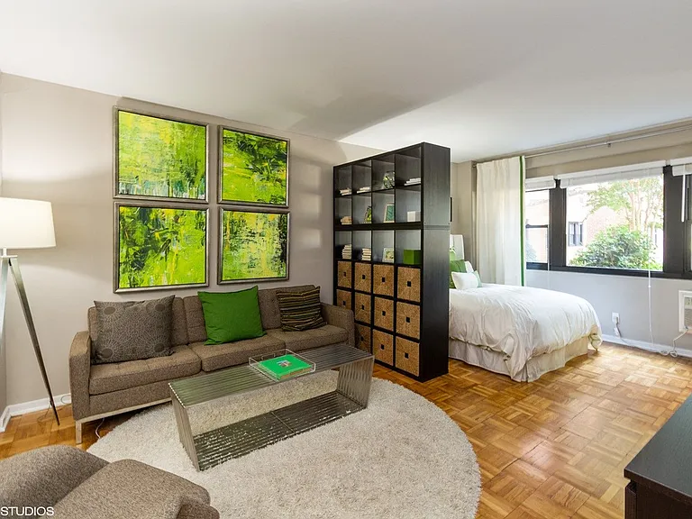 Studio model living area with wooden flooring