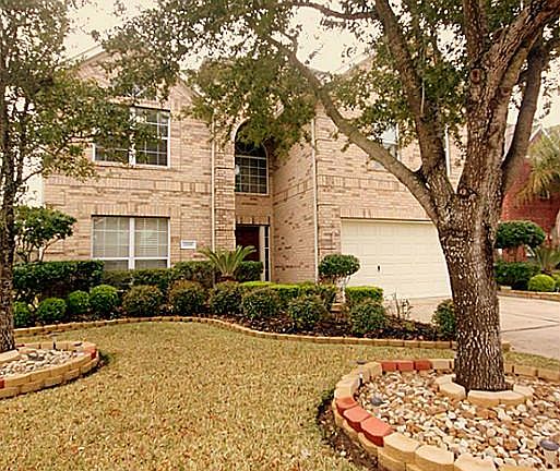 Great curb appeal with mature trees