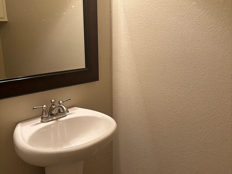 Powder room in hallway