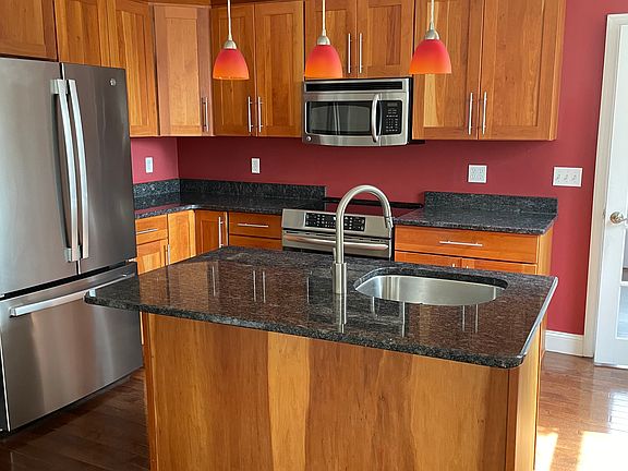 Kitchen with granite counters.