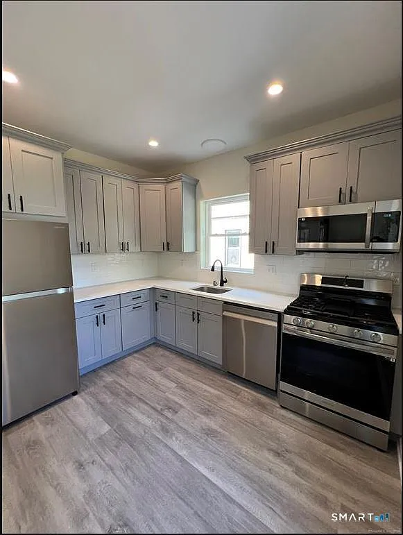 Building Photo - 37 Woodland St #2