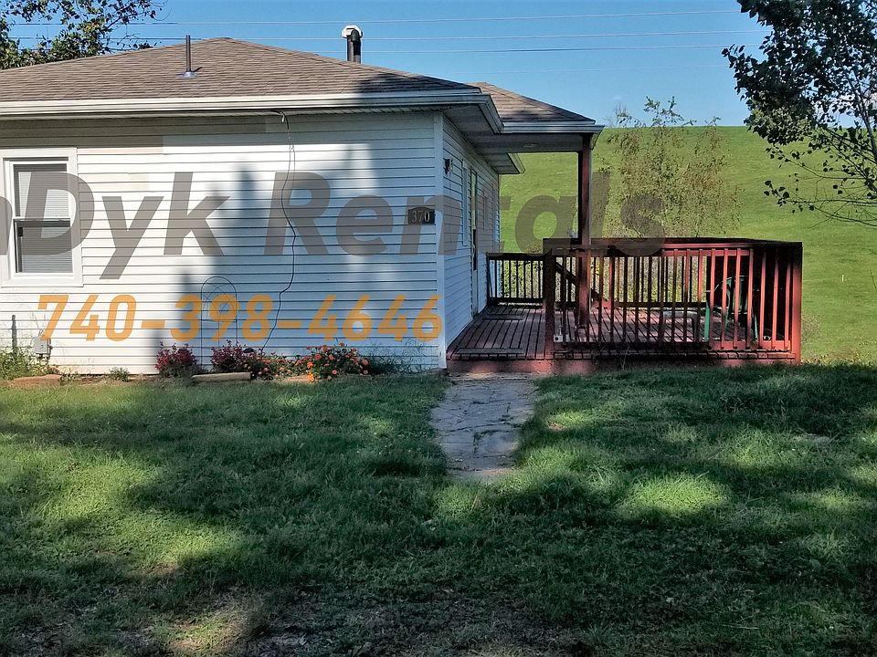 370 Grub Rd picture from driveway, Front of home with deck.