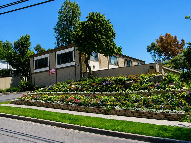 Nice small 4 unit building with off street parking
