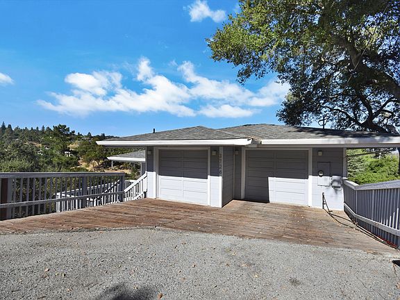 Driveway, garage and extra parking.