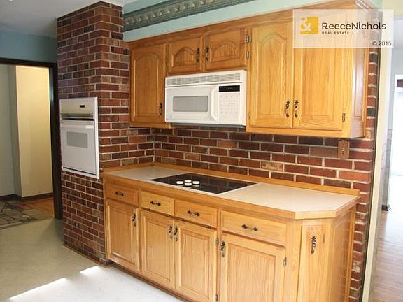 Updated Kitchen with oodles of cabinet & counter space.  Beautif