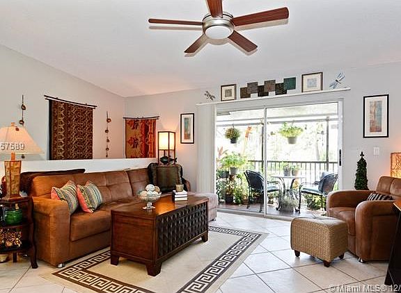Nice, bright and airy! Expansive terrace right off your main living area + volume ceilings!