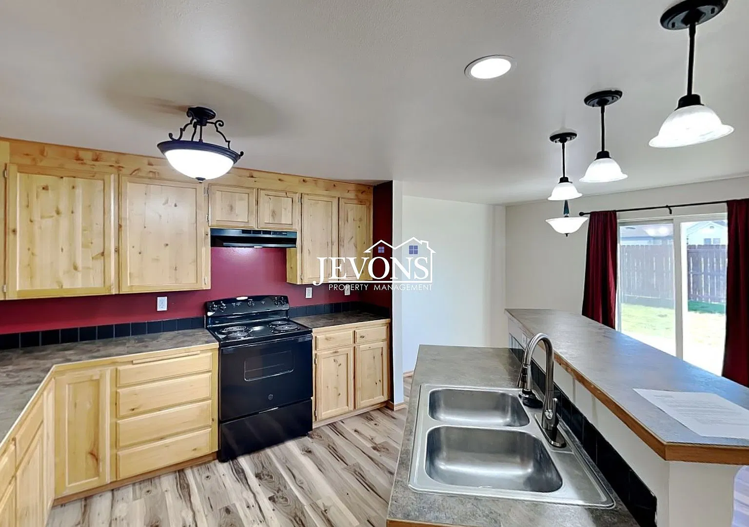 $500 Off First Month's Rent! Spacious 3-Bed, 2-Bath Home in Yakima with Fenced Yard and 2-Car Garage — Photo 2