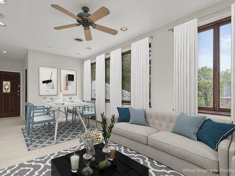 family room with eating area, full bathroom and direct access to garage and yard