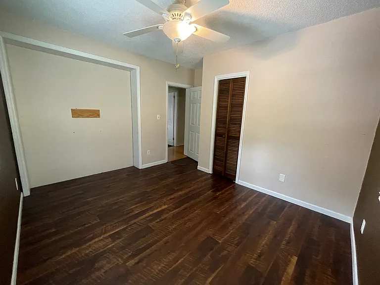 Bedroom 2: 11'x12" with 2 windows and closet.