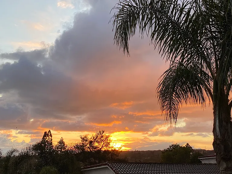 Sunset view from kitchen, living room and deck
