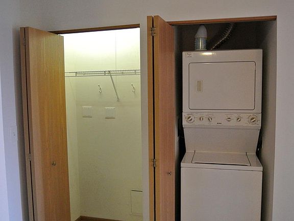 Hallway closet and W&D in unit.