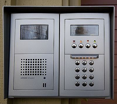 Intercom access for guests includes video camera & coded entry access.