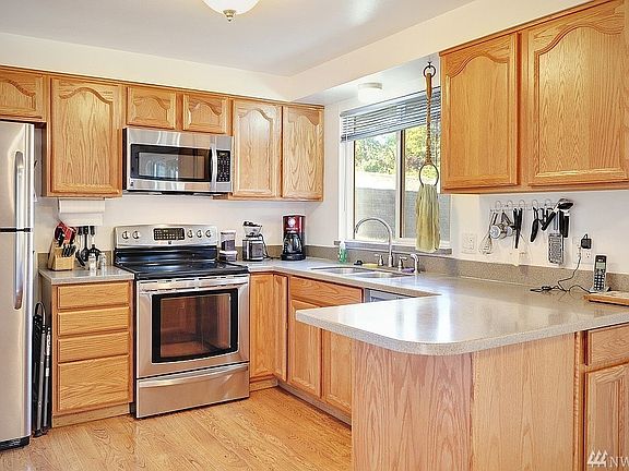 Updated kitchen with stainless steel appliances