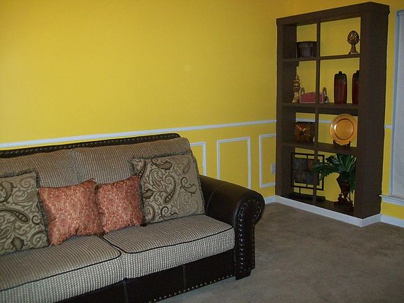 Great room features new built-ins, chair rail & shadow boxes trim