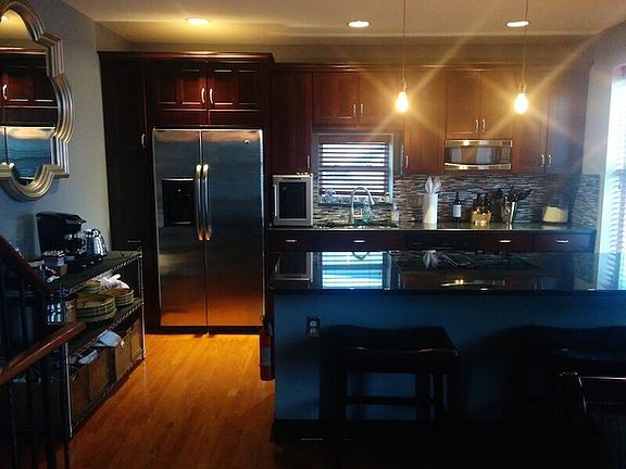 Upscale kitchen with granite, stainless steal applicance, is