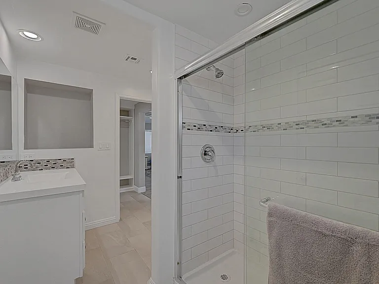 Updated vanity area with built-in shelving