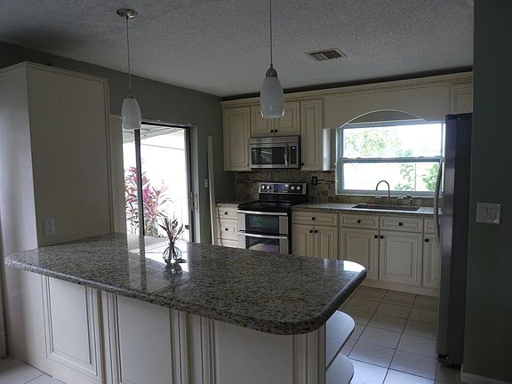 5th image of 5751 Mirror Lakes Boulevard
