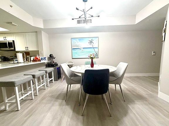 4th image of 5055 Wiles Road Unit 105