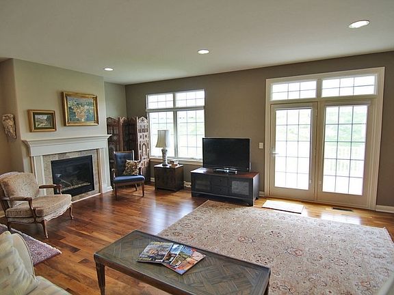 Main Living Area has Walnut Hardwood Floors and French Doors to Back Deck