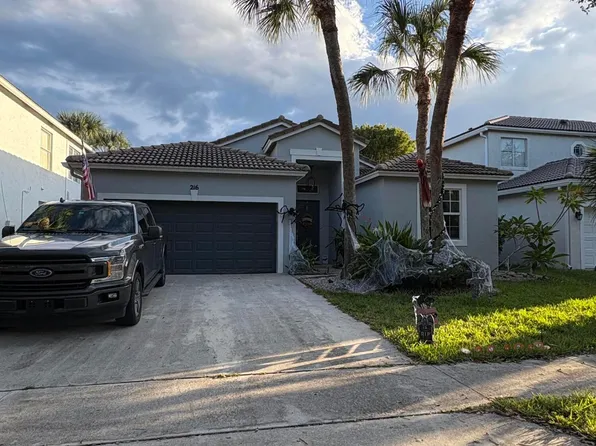 216 Seminole Lakes Drive, Royal Palm Beach, FL 33411